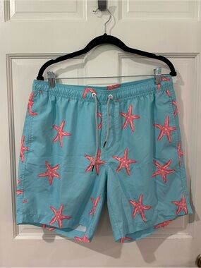 Maamgic. Turquoise Swim Trunks with Pink Starfish Print